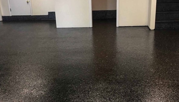 Dark flake epoxy basement floor