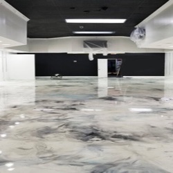 White and grey metallic epoxy floor in a commercial space