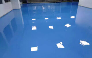 This image shows a blue commercial epoxy flooring floor.