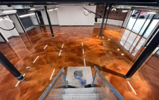 This image shows an industrial space with a shiny epoxy floor.