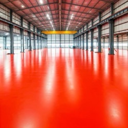 Red epoxy floor in a large industrial building